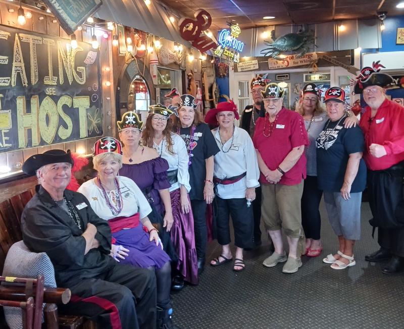 Celebrating Talk Like a Pirate Day at Crabby Dick’s are (l-r) Dennis Cipriano, Nancy Collins, Judy Picciotto, Kathy Dubonnet, Eric Dubonnet (hidden), Mae Cipriano, Captain BJ Young, Kenny Gill, Larry Heinle, Glenna Gill, Elsie Parkhouse and Dan Picciotto. Not shown are Ann Burton, Sherry and John Arigo, Sherry Palese, Connie Crisofulli, Eileen and John Loftus, Joann Dubois, Joann and Al McIlvain, Irmgard Dittmann, Judy Phillips, Peggy Scheibe, Pat and Russ Faust, and Ron Collins. SUBMITTED PHOTO